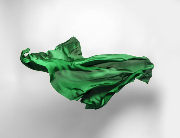 abstract piece of green fabric flying, high-speed studio shot - Fotoğraf, Görsel