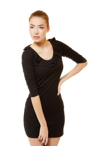 Portait of beautiful delightful young woman with perfect body in black dress - Fotó, kép