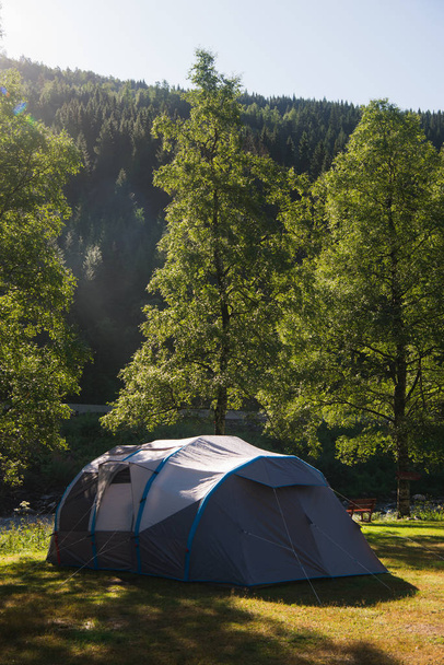 Summer landscape with camp tent forest in Gudvangen, Neirofjord, Norway  - Foto, afbeelding