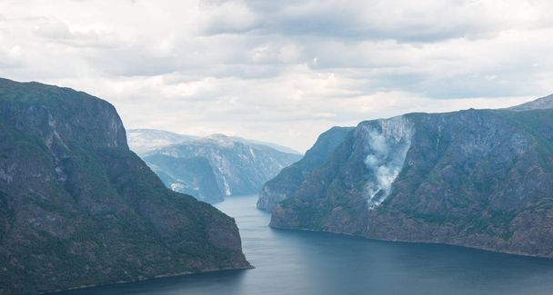 Majestic view of sea and Aurlandsfjord from Stegastein viewpoint, Aurland, Norway - 写真・画像