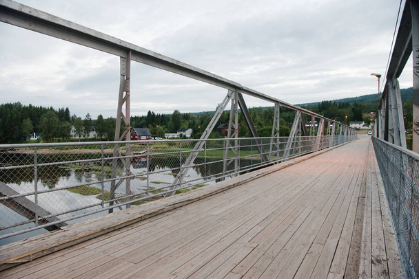 Bridge over the river in Trysil, Norway's largest ski resort  - Photo, image