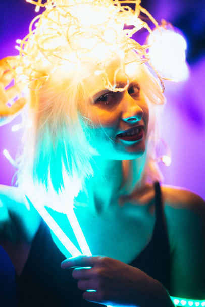 Portrait girl Strip Light LED tape on dark color background. - Fotoğraf, Görsel