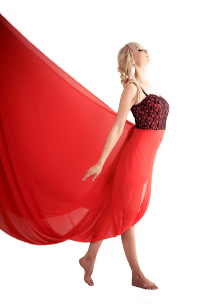 Beautiful woman in a red dress - Φωτογραφία, εικόνα