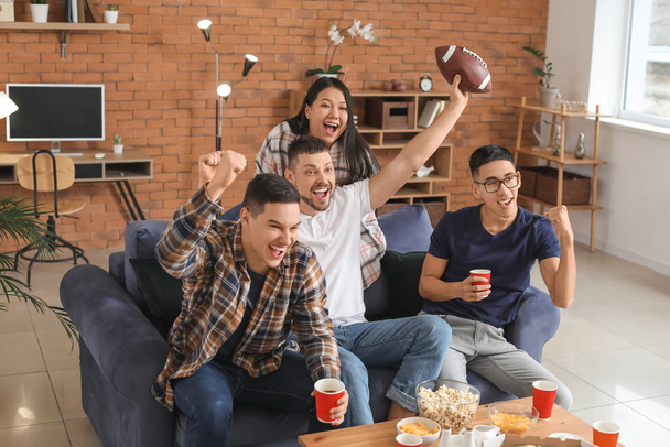 Group of fans watching rugby on TV - Photo, Image