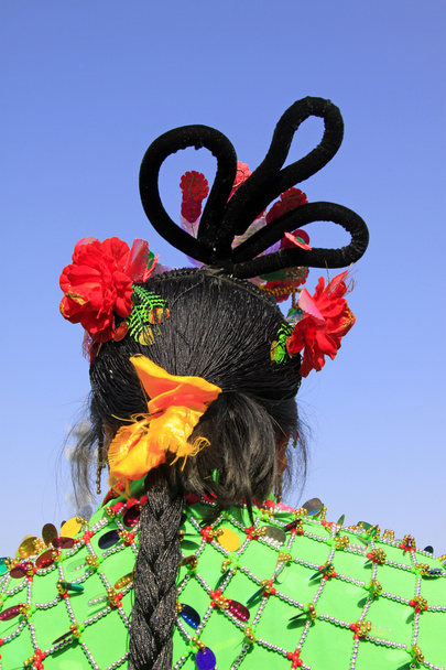 decoración del cabello para el Festival de Primavera danza yangko en China
 - Foto, Imagen