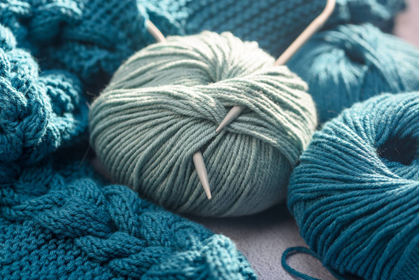 balls of colored yarn with knitting needles close-up - Valokuva, kuva