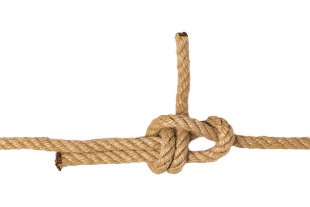 Rope isolated. Closeup of figure node or knot from two brown ropes isolated on a white background. Navy and angler knot or sailorknot. Macro. - Φωτογραφία, εικόνα