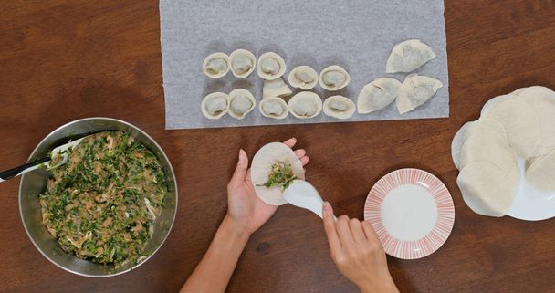 Top view of making chinese meat dumpling - 写真・画像