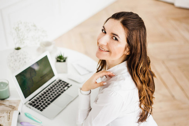 Woman working at a computer, freelancer or Manager, self-employed, business - Fotó, kép
