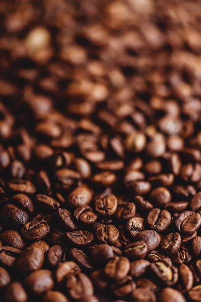Coffee grains. Background of roasted coffee beans brown. layout. - 写真・画像