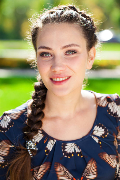 Portrait close up of young beautiful brunette woman - Fotó, kép