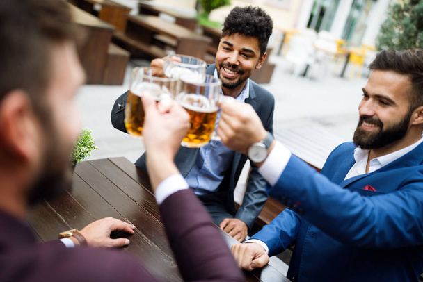 People, men leisure drink friendship and celebration concept - Foto, Imagem