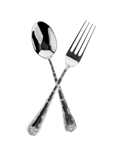 fork and spoon are crossed on white - Photo, Image