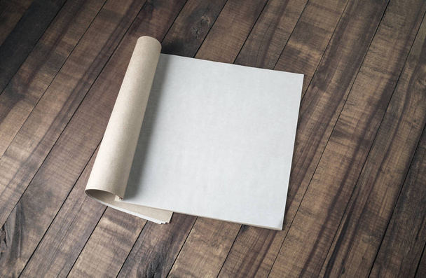 Blank brochure or magazine template on wooden background. Responsive design mockup. - Foto, afbeelding