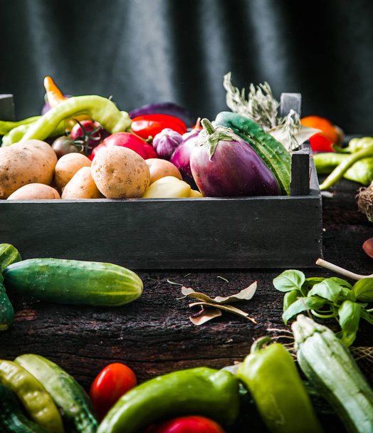 Vegetables on wood. Organic vegetables in rustic setting. Fresh food. Healthy veggies - Foto, Bild