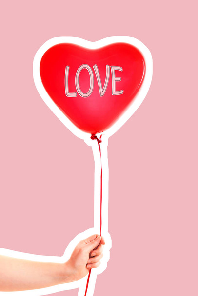Female hand holds red rubber inflatable heart shape balloon. Love, relationship, valentines day and birthday celebration concept. Magazine style fashion collage with blank copy space - Fotografie, Obrázek