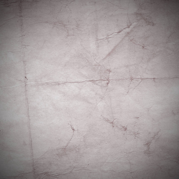 Old background with dust and dirty stains. Blank aged paper sheet. Vintage and antique art concept. Texture like cardboard, stone, concrete or natural marble. - Photo, Image