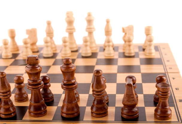 Σκακιστικά κομμάτια στο ταμπλό - Φωτογραφία, εικόνα