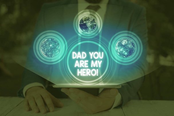 Handwriting text Dad You Are My Hero. Conceptual photo Admiration for your father love feelings compliment Elements of this image furnished by NASA - Photo, Image