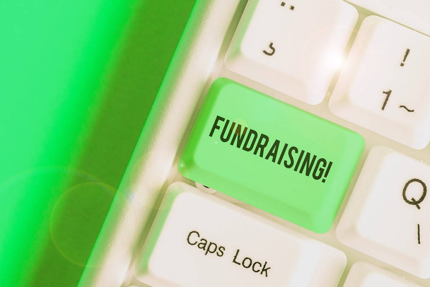 Word writing text Fundraising. Business photo showcasing seeking to generate financial support for charity or cause - Photo, Image