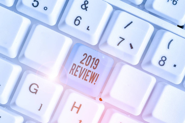 Text sign showing 2019 Review. Business photo showcasing remembering past year events main actions or good shows - Photo, Image