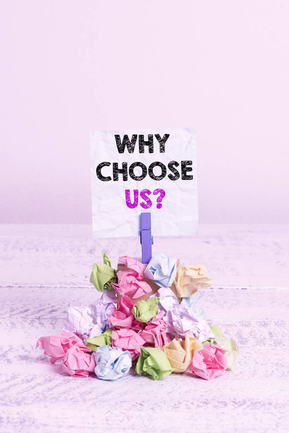 Handwriting text Why Choose Us question. Conceptual photo Reasons for choosing our brand over others arguments Reminder pile colored crumpled paper clothespin reminder white wooden space - Photo, Image