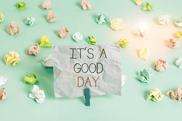 Writing note showing It s is A Good Day. Business concept for Happy time great vibes perfect to enjoy life beautiful Colored crumpled papers empty reminder blue floor background clothespin - Photo, Image