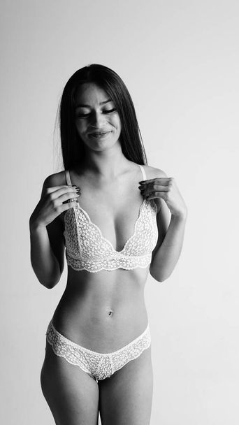 Girl in lingerie on white background - Foto, Bild