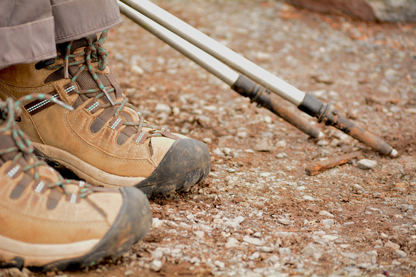 Hiking boots on the ground - 写真・画像