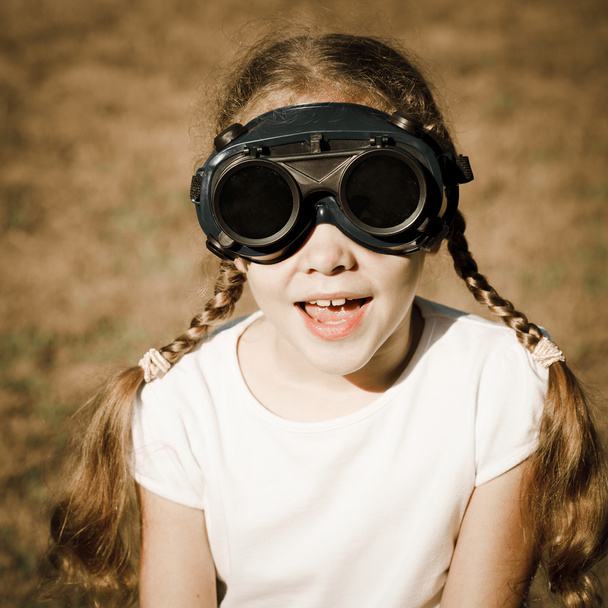 Girl in the welding goggles - Фото, изображение