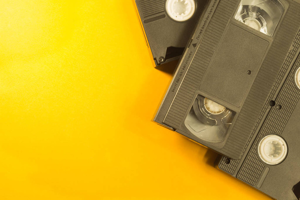 Video cassette isolated on yellow background. vhs with copy space - Foto, Bild