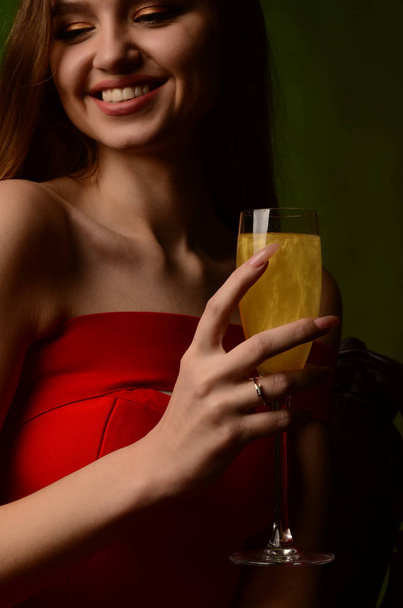 Gold ring with diamonds girl glass of champagne - Foto, Imagen