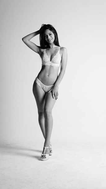 Girl in lingerie on white background - Zdjęcie, obraz
