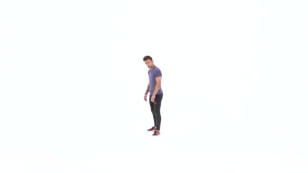 Homem está dançando breakdance no fundo branco em camiseta cinza simples e jeans cinza
 - Filmagem, Vídeo