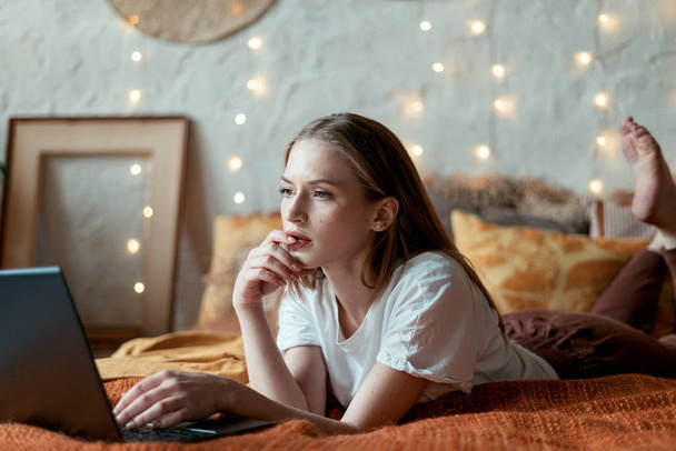 Young adult girl resting in bedroom at home - Photo, image
