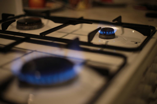 round burning gas burner, kitchen stove fire for cooking - 写真・画像