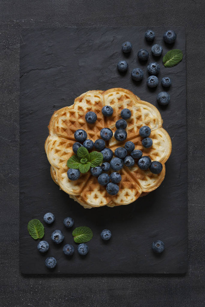 Soft Viennese waffles with blueberries. Top view, close-up  - Foto, Imagem