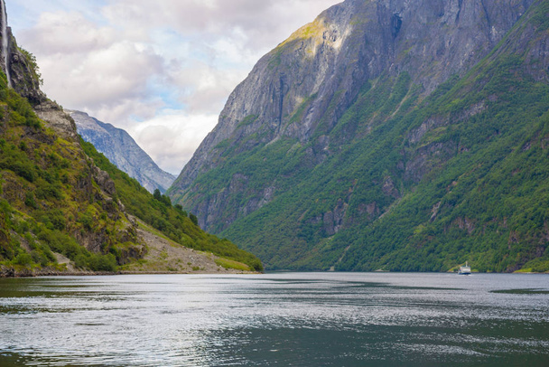 Panoramic view of Geiranger fjord near Geiranger seaport, Norway. Norway nature and travel background. View from the ferry on the fjord in Norway. - Zdjęcie, obraz