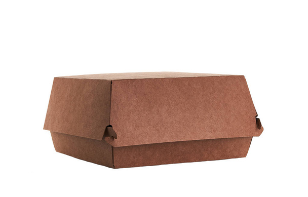 Caja de papel kraft en blanco cerrado para hamburguesa aislada sobre fondo blanco
 - Foto, imagen