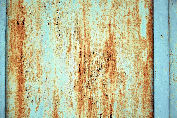 Metal texture, rusty metal with peeling paint, pieces of metal with welds. Background, copy space. - Photo, Image