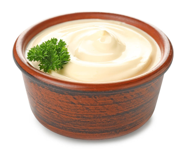Bowl of tasty sauce on white background - Foto, afbeelding