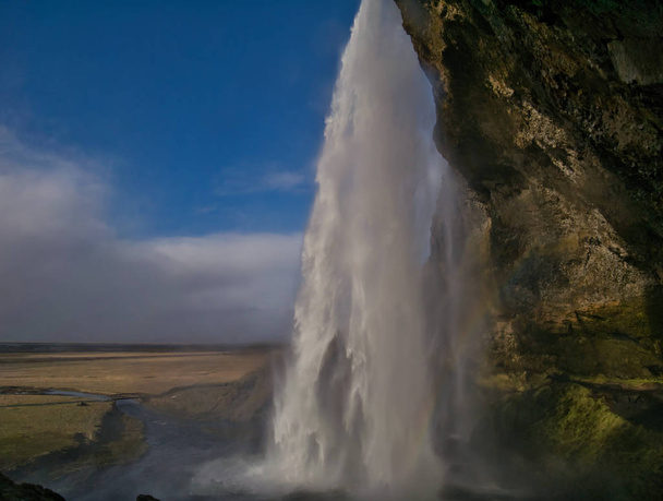 The Seljalandsfoss waterfall in Iceland photographed from the side - Φωτογραφία, εικόνα