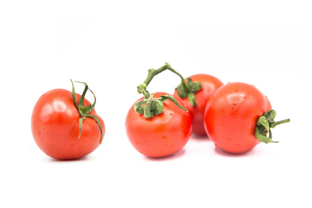 ripe fresh organic tomatoes in drops of water Isolated on a white background - Φωτογραφία, εικόνα