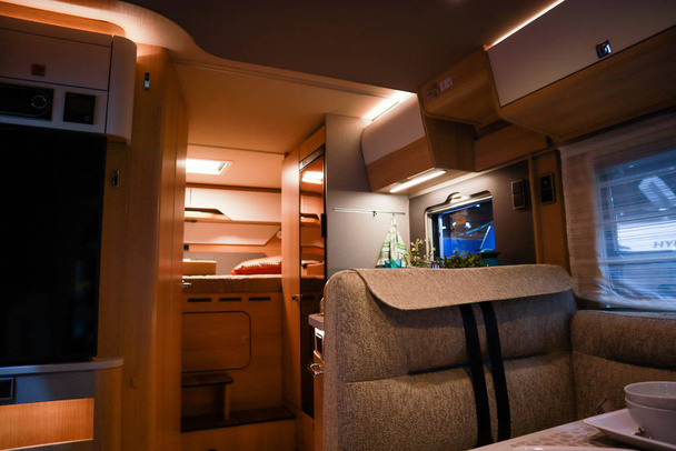 Interior of luxury caravan. Detail photo of coach with equipment - Photo, Image