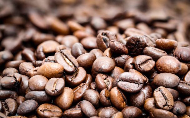 Finely roasted coffee beans that suggest a delicious aroma - Photo, Image