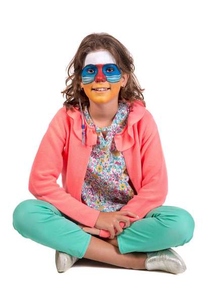 Girl with animal face-paint isolated in white - Fotó, kép