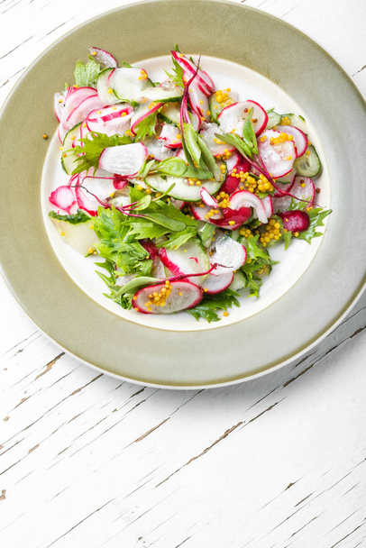 Healthy vegetarian salad with radish.Fresh vegetables food - Photo, image