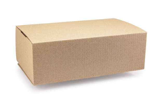 cardboard box for parcels from craft isolated on white background, delivery concept, mock up, copy space - 写真・画像