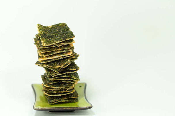 stack of green tea cake on white background - Foto, afbeelding