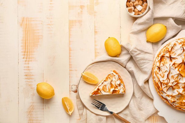 Tarte au citron savoureuse sur table en bois
 - Photo, image